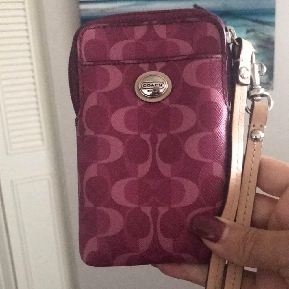 Leather coach card holder or cigarette holder. I do not smoke. Pink color